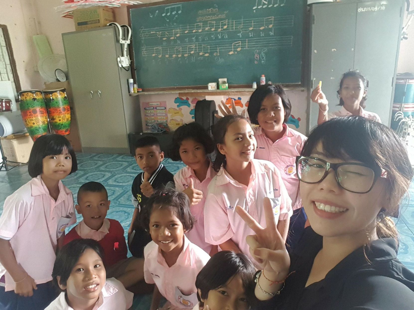 Katty Lau with her students in Thailand